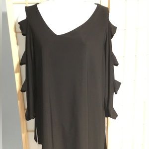 Last Tango Black Top with cutout sleeves, asymmetrical neckline and hem.